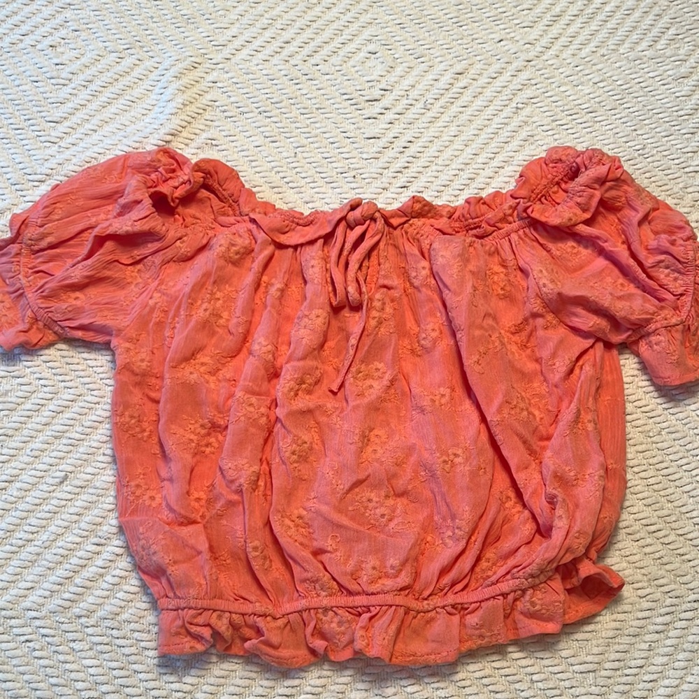 Coral off the shoulder crop